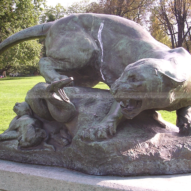 lion and serpent sculpture