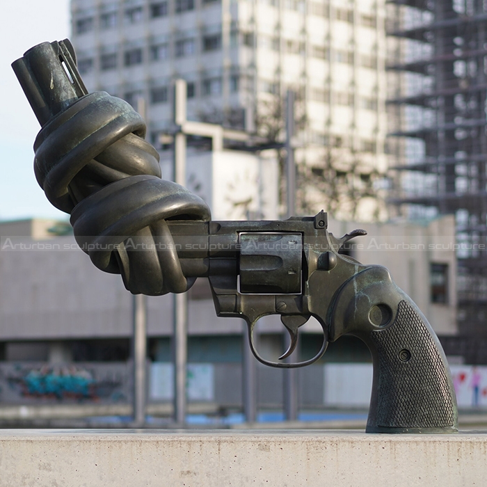 knotted gun sculpture