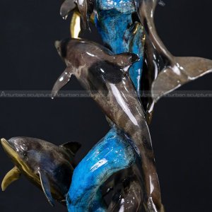 dolphins leaping garden ornament