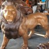 large brass lion statue