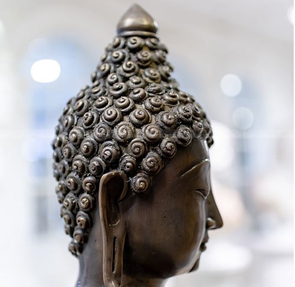 meditating buddha statue