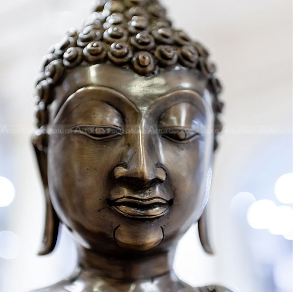 meditating buddha statue