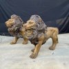 lion statues outside house