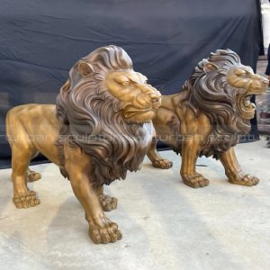 lion statues outside house