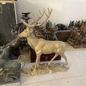 brass deer sculpture