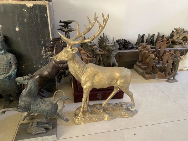 brass deer sculpture