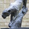 Leopard Descent statue