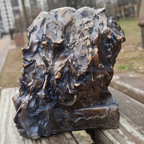 Dog Face Sculpture