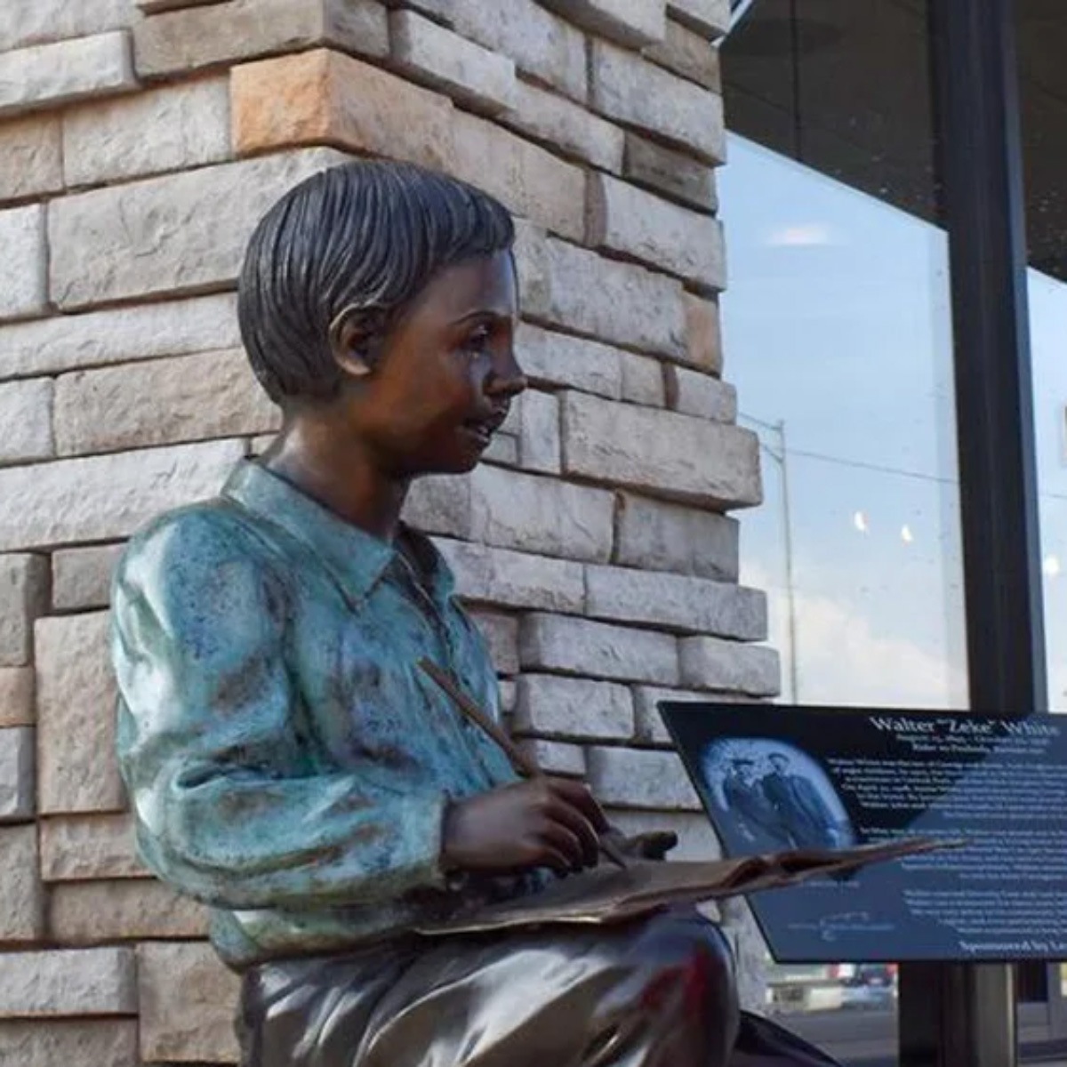 Boy Learning Statue