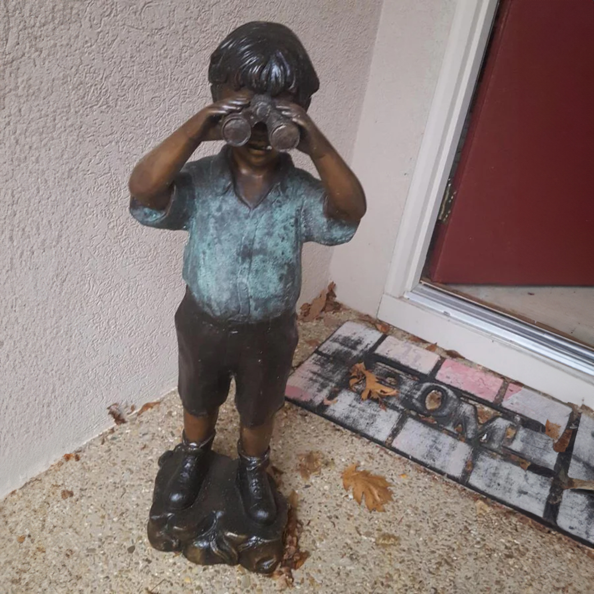 Bronze Curious Boy Statue