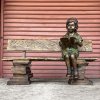 Girl Reading on Bench Statue