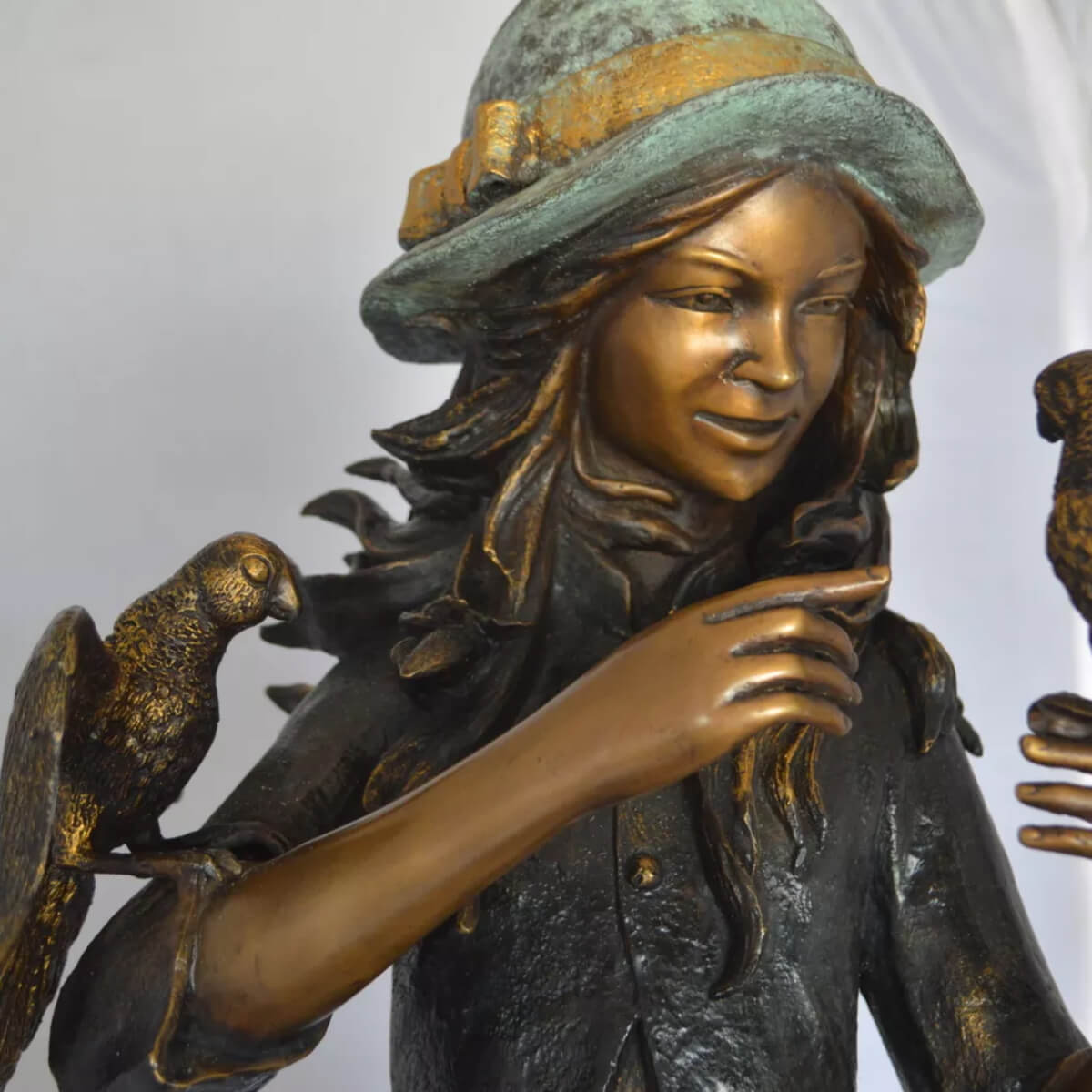 Girl and Parrots Sculpture