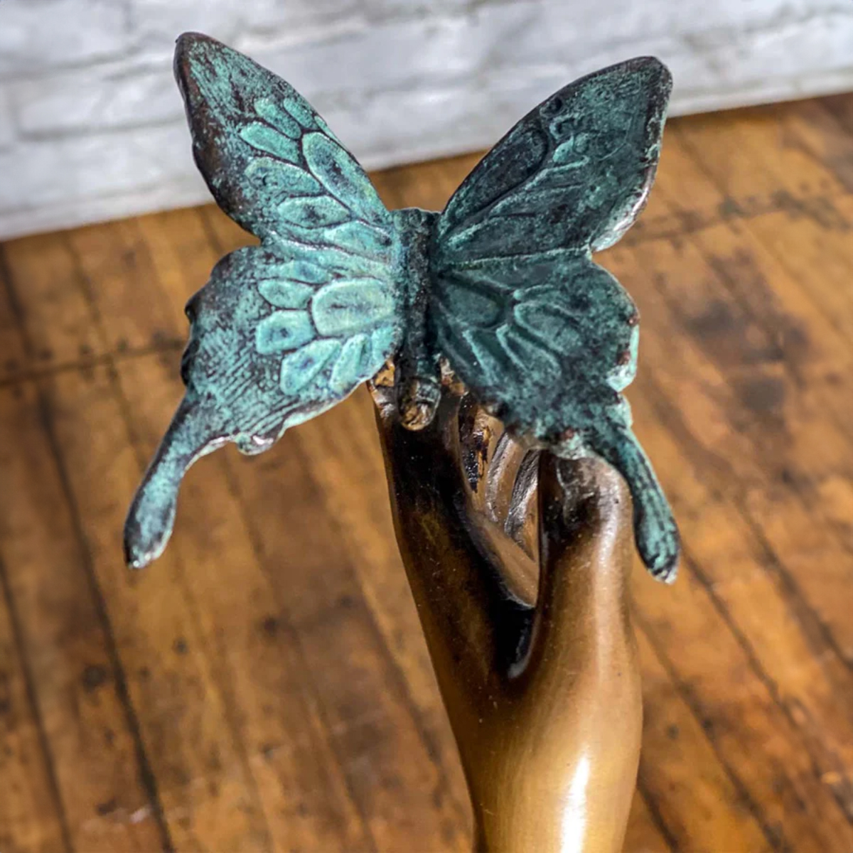 Large girl with butterfly statue