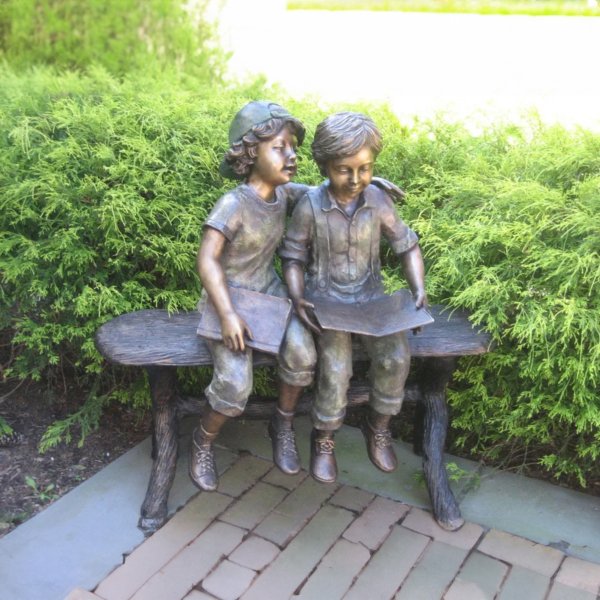 Two Boys on Bench Statue