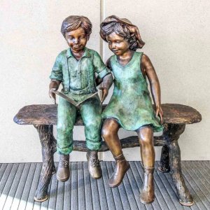 Two Kids Reading Statue