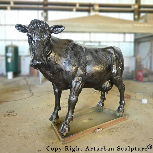 metal cow statue