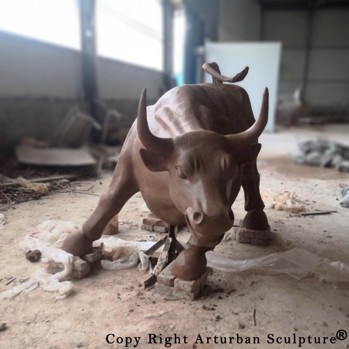 clay mold of the Charging Bull of Wall Street