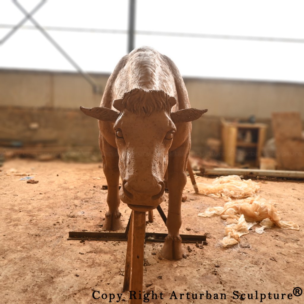 clay mold of metal Cow Sculpture