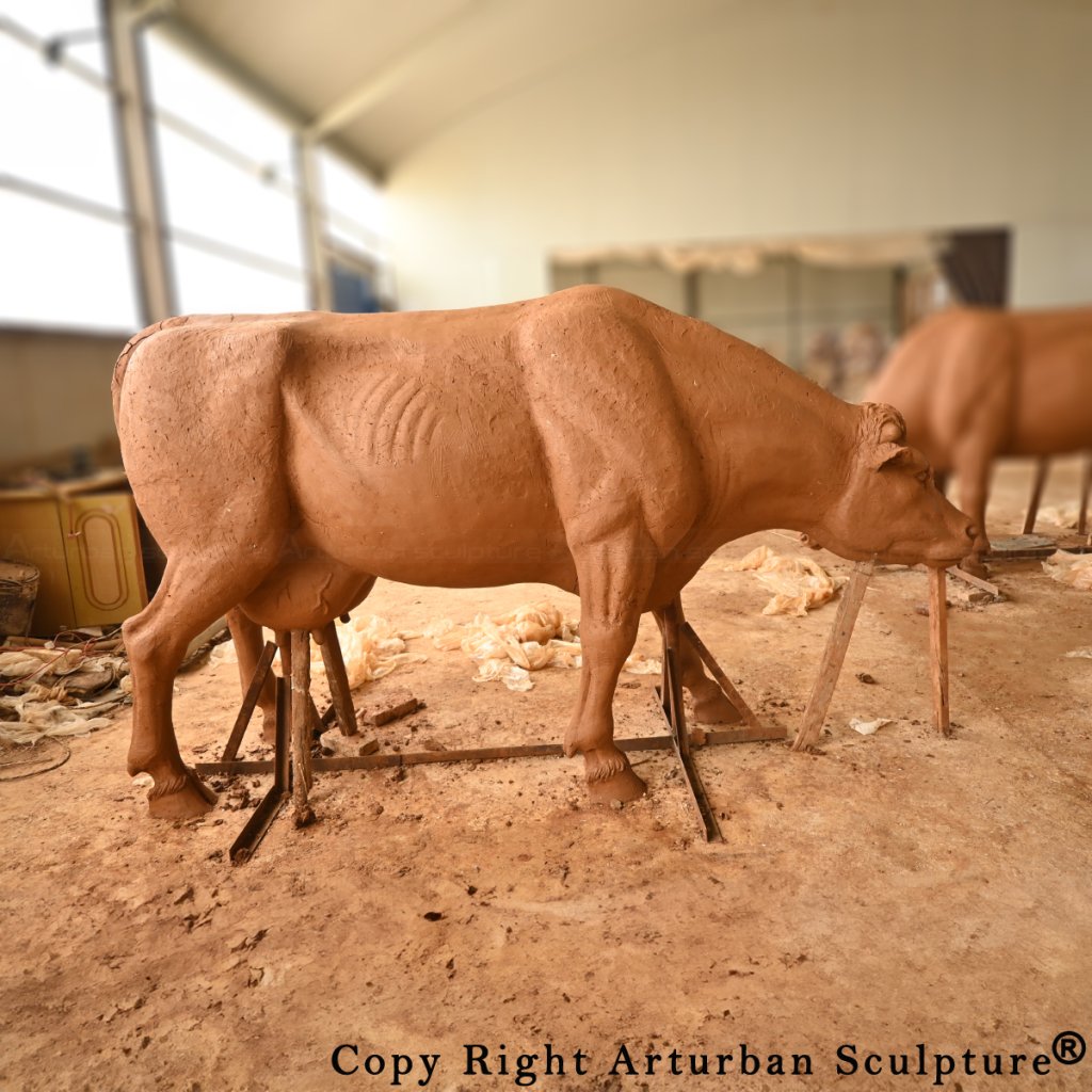 clay mold of metal Cow Sculpture