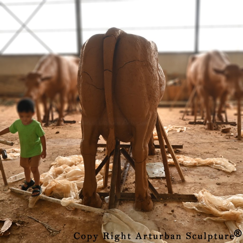 clay mold of Cow Sculpture